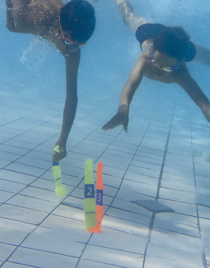 Neon orange and purple Fashy neoprene diving steamer buoys numbered 2 and 3