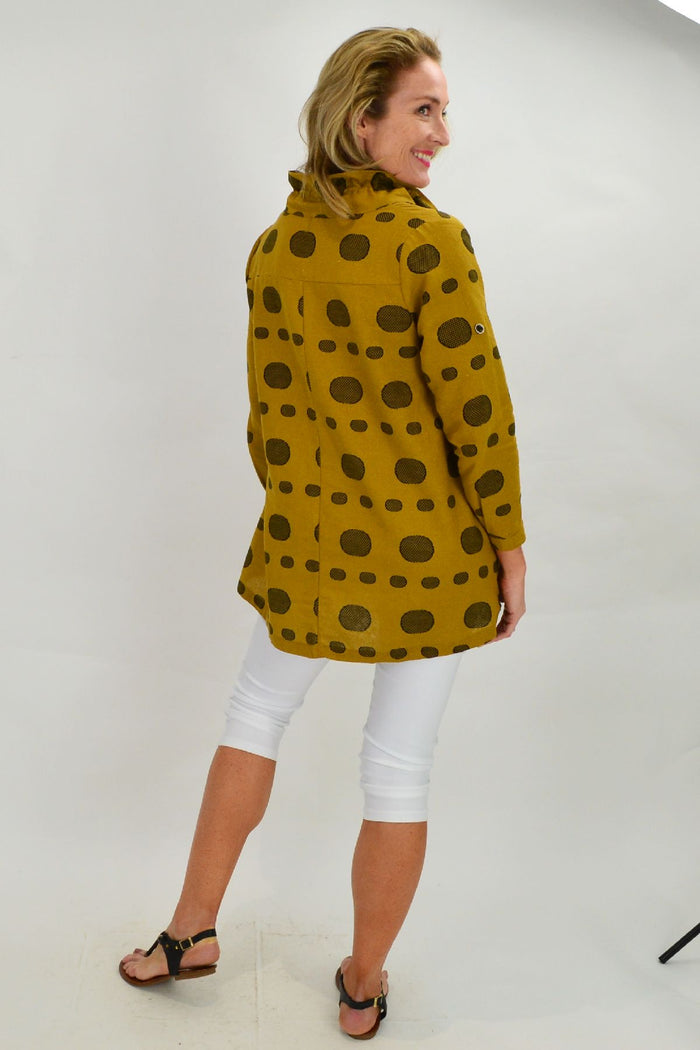 Mustard spot high collar tunic shirt by Ruby Rain featuring a stylish high neckline and playful spotted pattern.