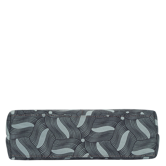 Olive green printed canvas shoulder‑sling bag with soft relaxed silhouette for travel and everyday use-bottom view