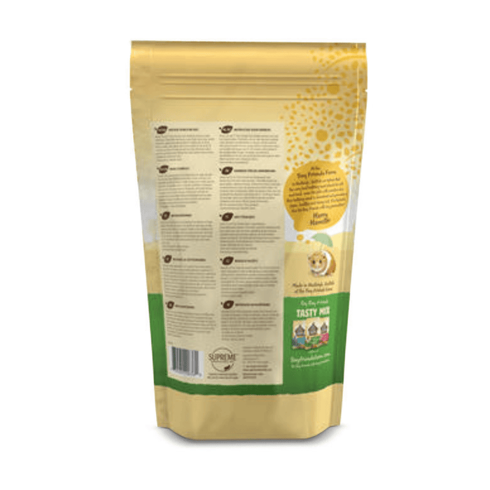 White background with a back view of a bag of Tiny Friends Farm Bathing Sand for small animals. Pictured on the bag is a Hamster.