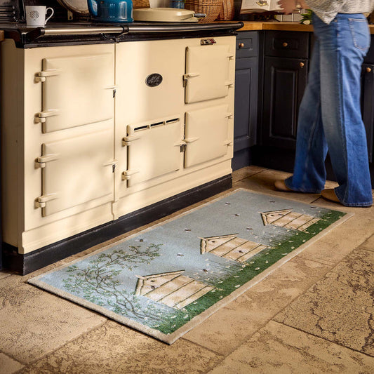 Aura Beehive Washable Blue Runner with a nature-inspired design, styled in a doorway.