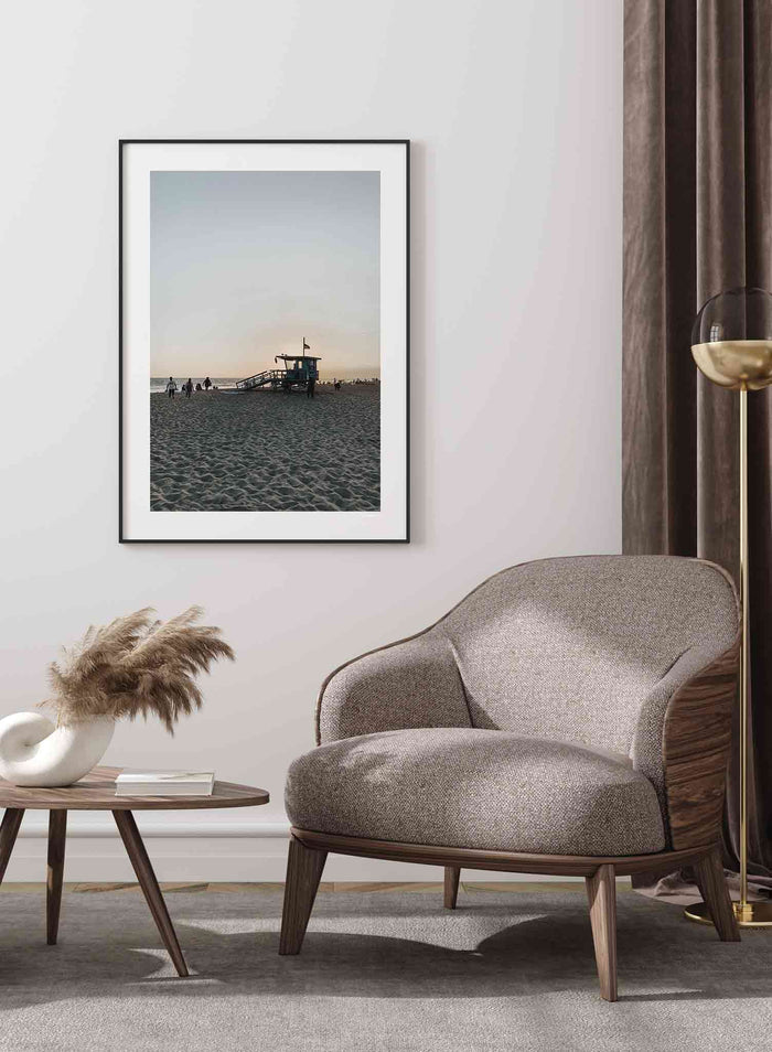 Beach Exit is a summer photography poster of a sandy beach at dusk featuring a lifeguard tower by Opposite Wall.