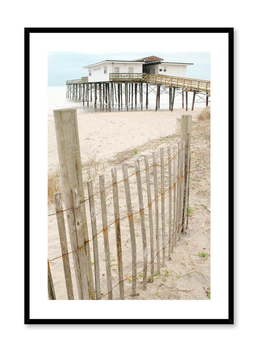 Beach House is a minimalist photography of the perspective of the observer walking down a walkway leading to the beach overseeing a beach house by Opposite Wall.
