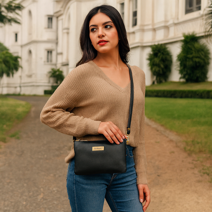 Women's black leather crossbody sling bag for work, travel, and daily use-model image