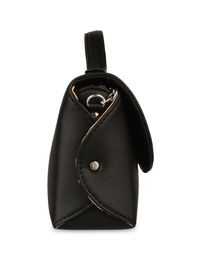 Women’s black vegan leather top handle crossbody sling shoulder bag-side view
