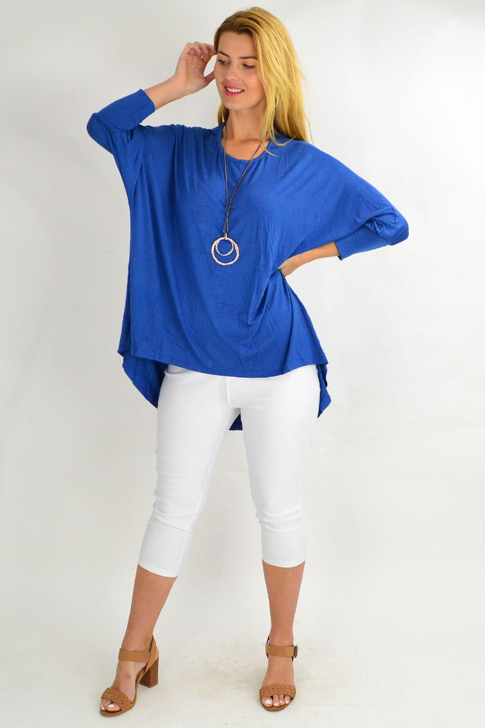 Blue bamboo tunic top by Hourglass, shown on a hanger with soft fabric and relaxed fit, highlighting casual elegance and lightweight comfort.