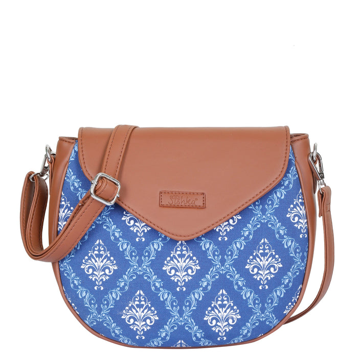 Blue printed canvas shoulder‑sling bag with tall soft silhouette for work and everyday use