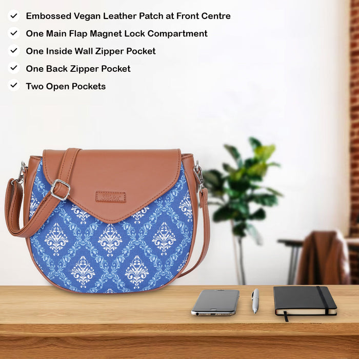 Blue printed canvas shoulder‑sling bag with tall soft silhouette for work and everyday use-feature image