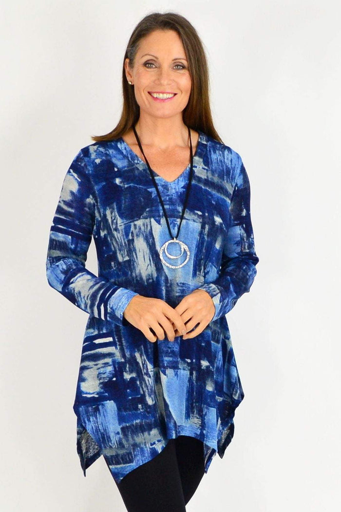 Stylish blue Nova tunic top by Stylius, featuring a comfortable fit and casual design, shown on a model.