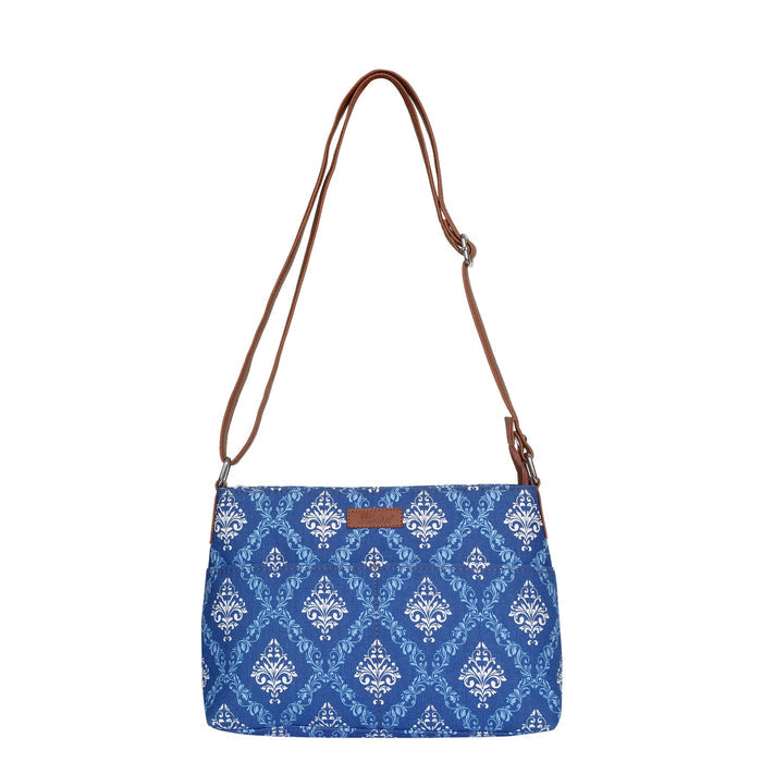 Blue printed canvas shoulder‑sling bag with soft relaxed silhouette for work and everyday use