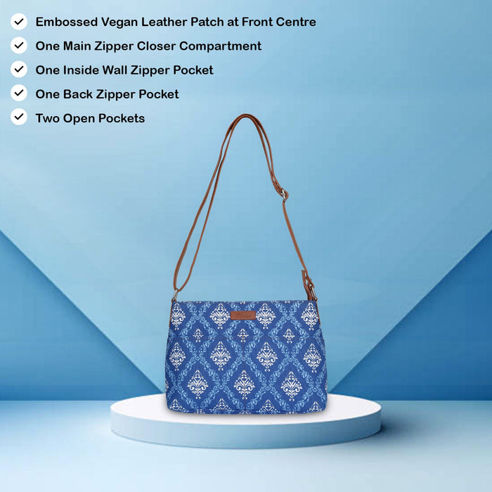 Blue printed canvas shoulder‑sling bag with soft relaxed silhouette for work and everyday use-feature image