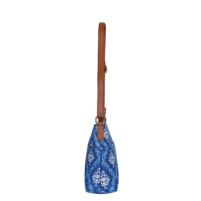 Blue printed canvas shoulder‑sling bag with soft relaxed silhouette for work and everyday use-side view