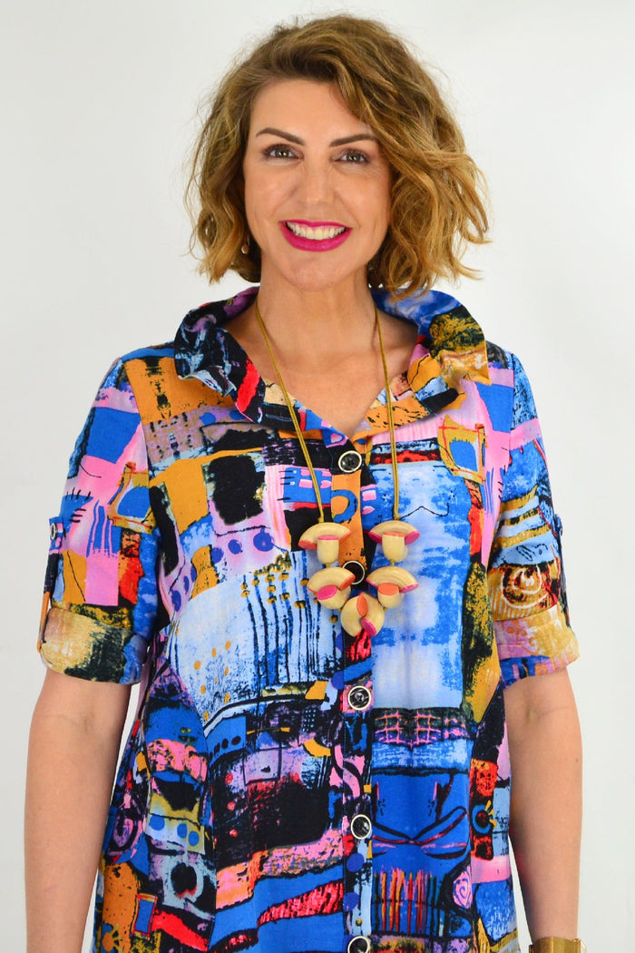 Blue train-pattern high collar tunic shirt by Ruby Rain, featuring a stylish design and button-front detail.