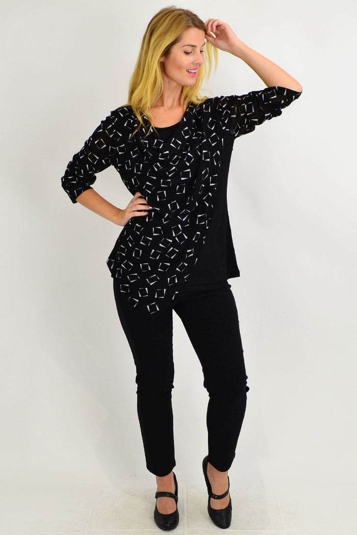 Stylish black and white cowl neck tunic top by Stylius, featuring a comfortable fit and modern design, displayed on a mannequin.