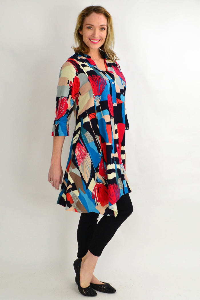 Hourglass cheery tulip stand collar long shirt tunic with a relaxed fit and long sleeves, displayed on a hanger.