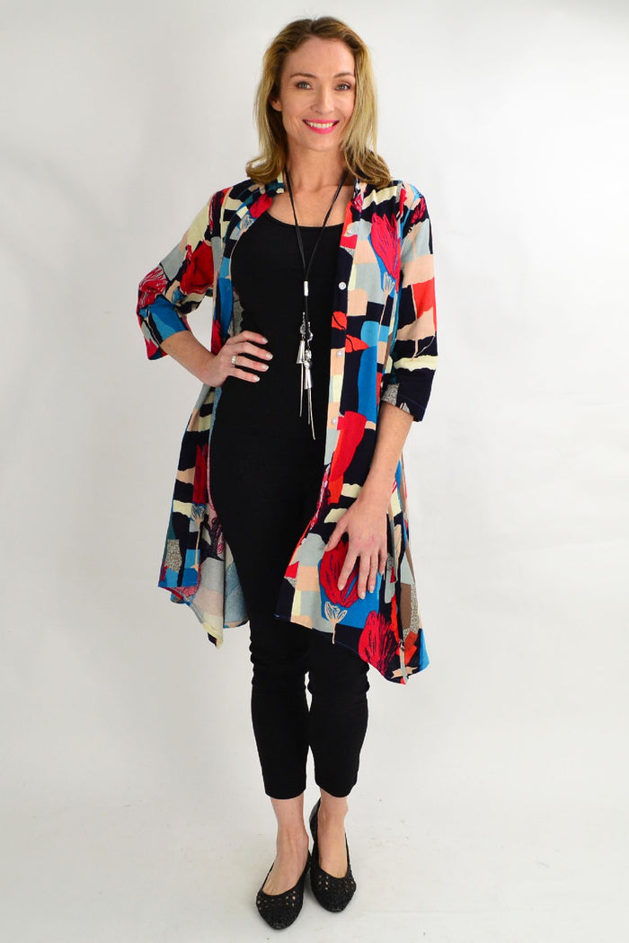 Hourglass cheery tulip stand collar long shirt tunic with a relaxed fit, featuring a flowy silhouette and long sleeves.