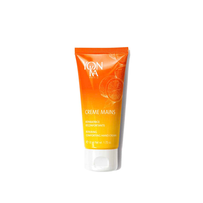 Creme Mains Hand Crème | Yon-Ka Paris in an orange and yellow gradient tube with citrus design, moisturizing and comforting hand cream for skincare and body care.
