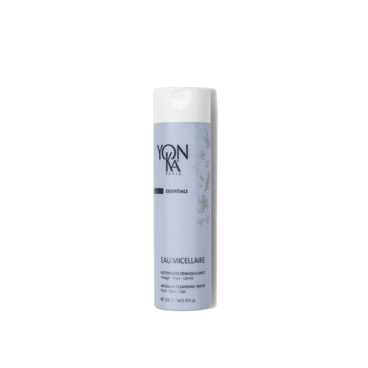 Bottle of Eau Micellaire Cleanser Makeup remover | Yon-Ka Paris with a light blue label, designed for gentle skincare and makeup removal.