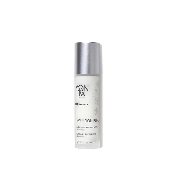 Bottle of Emulsion Pure Purifying Tonic | Yon-Ka Paris, a skincare product for purifying and revitalizing the skin, featuring a sleek silver cap and minimalist design.