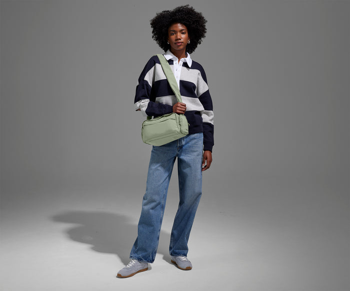 Person wearing the Featherlight Cargo Pack
// Model is 5'9"
