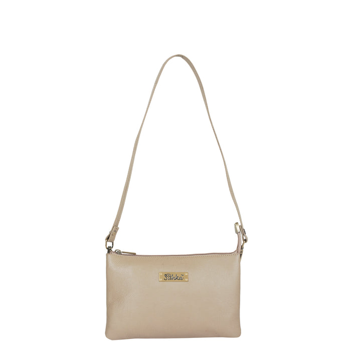 Women's taupe leather crossbody sling bag for work, travel, and daily use