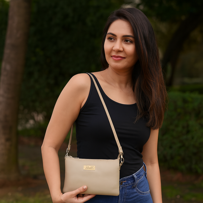Women's taupe leather crossbody sling bag for work, travel, and daily use-model image