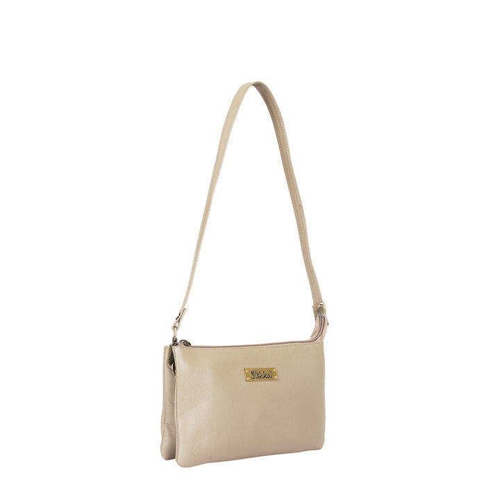 Women's taupe leather crossbody sling bag for work, travel, and daily use-half side view