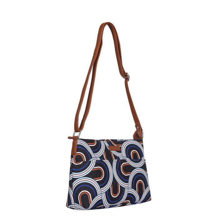 Abstract printed canvas shoulder‑sling bag with soft relaxed silhouette for office and daily use-half side view