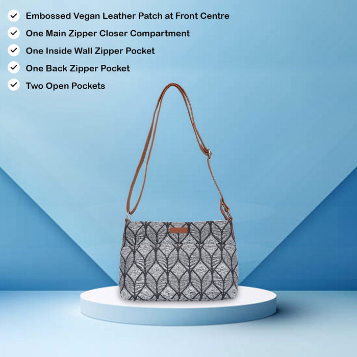 Monochrome printed canvas shoulder‑sling bag with soft relaxed silhouette for daily and travel use-feature image