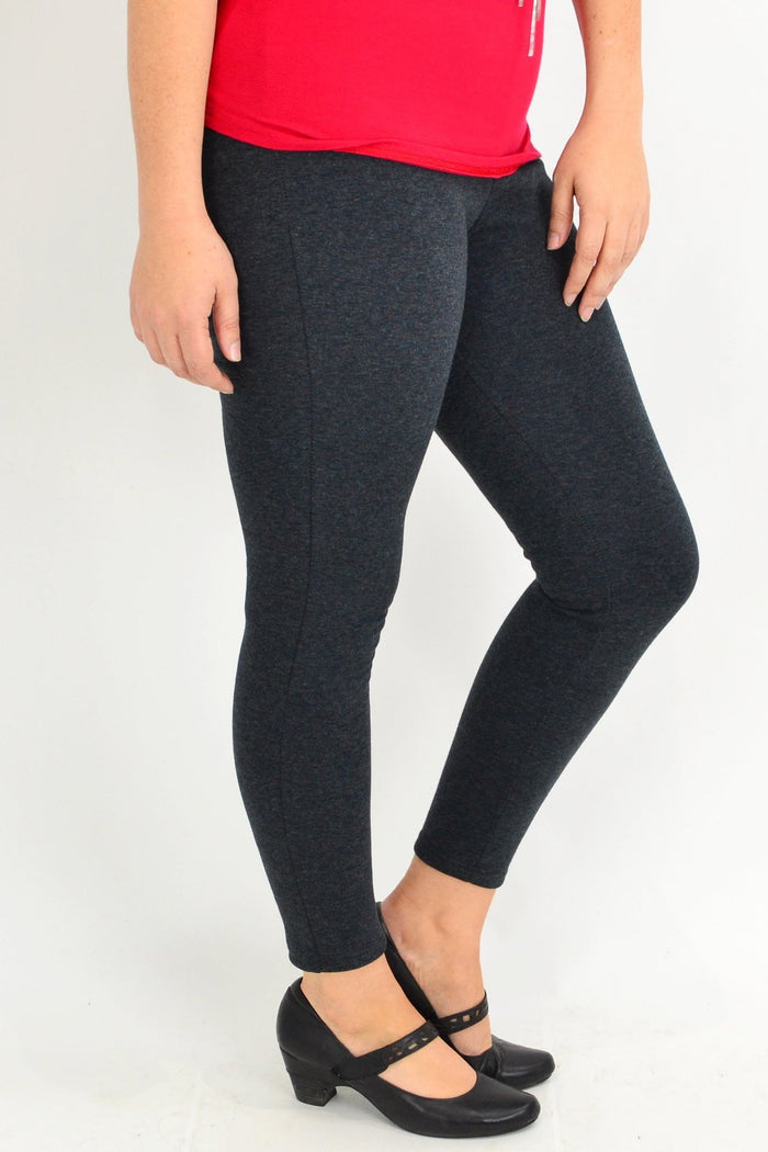 Grey fleece-lined full-length leggings from Whispers, soft and cozy for winter, shown on a model in a casual outfit.