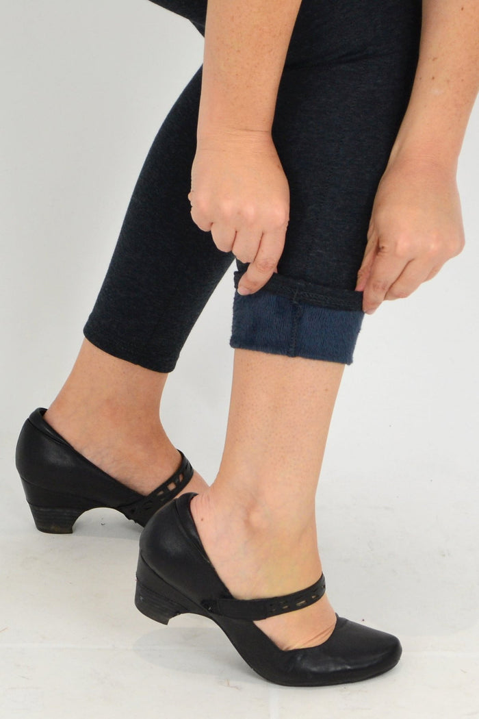 Grey fleece-lined full-length leggings by Whispers, shown on a model, perfect for cozy winter wear.