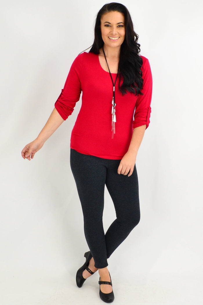 Grey fleece-lined full-length leggings by Whispers, shown in a cozy winter outfit, with a comfortable and stretchy fit.