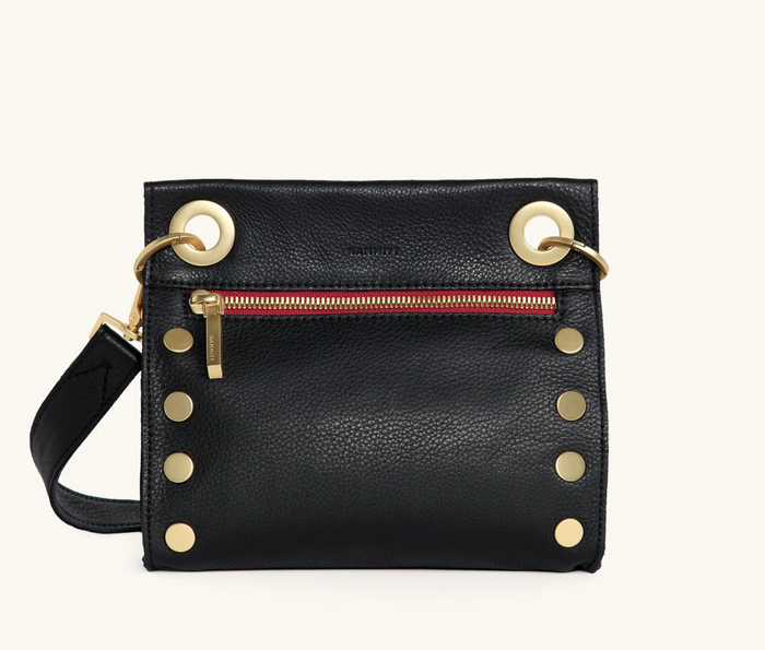 Crossbody black leather bag with red zipper and gold hardware