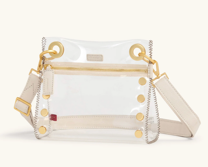 clear bag with gold and white leather strap