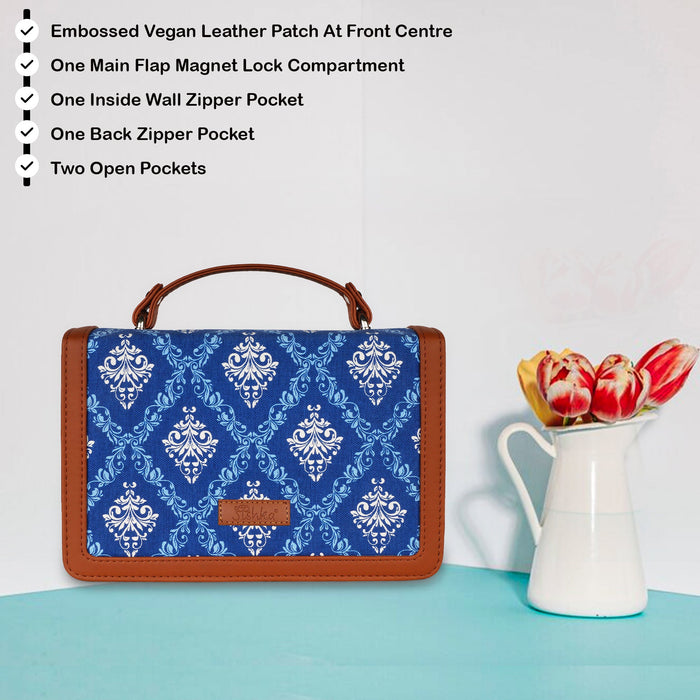 Blue printed canvas crossbody sling bag with slim horizontal silhouette for work and everyday use-feature image