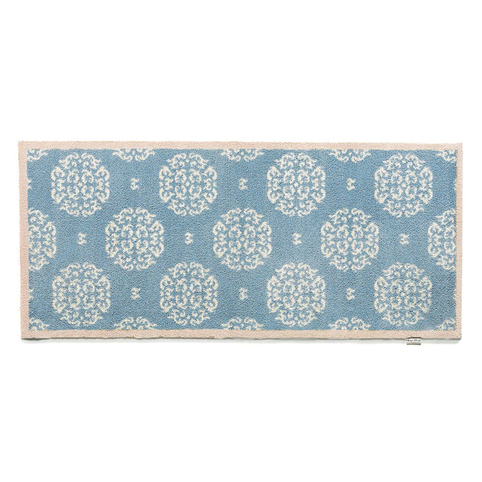 Home 15 Blue Washable Runner in Blue - a 100% recycled cotton runner featuring a delicate white floral pattern.