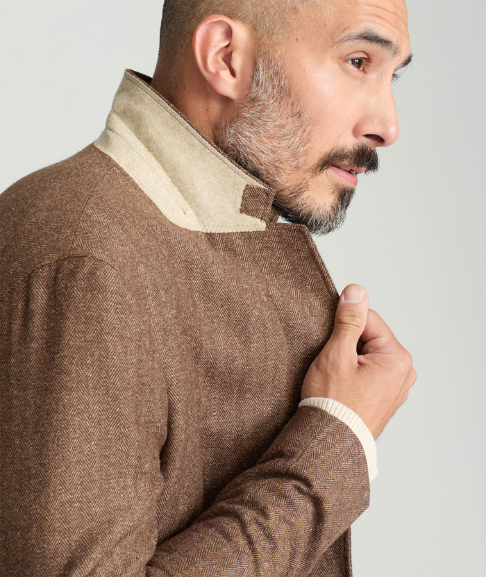 Model is wearing UNTUCKit Italian Wool Rawlins Sport Coat in Tan Herringbone.