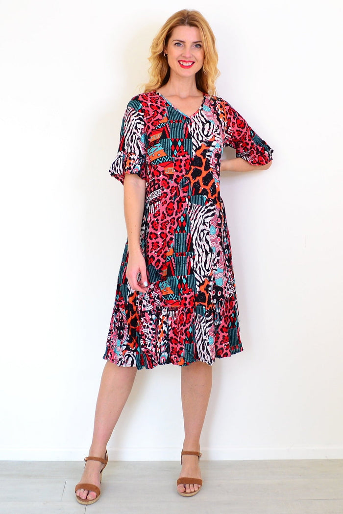 One Summer Jessica sleeved tunic dress in soft fabric, featuring a relaxed fit and long sleeves, perfect for casual wear.