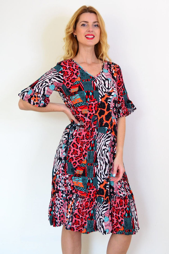 Jessica sleeved tunic dress by One Summer displayed on a hanger, featuring a relaxed fit and casual style.