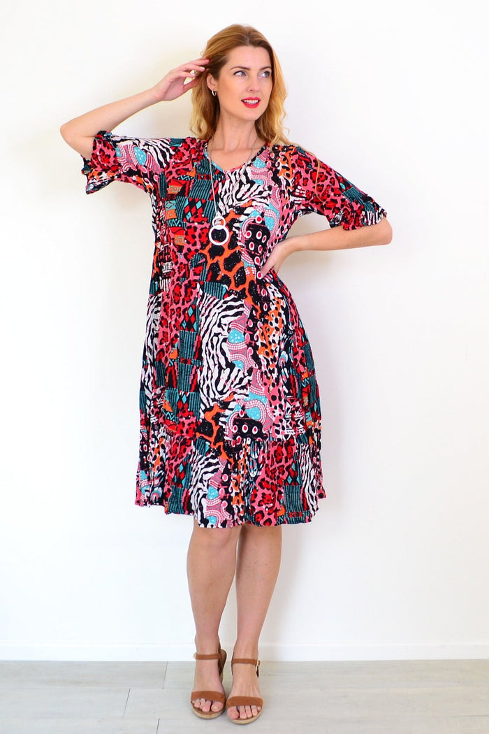 Jessica sleeved tunic dress by One Summer, shown in a relaxed fit with long sleeves and a casual style in a natural pose.
