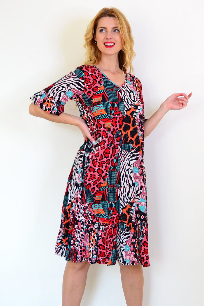 Jessica Sleeved Tunic Dress by One Summer, showcasing a stylish long-sleeve tunic with a relaxed fit and casual design.