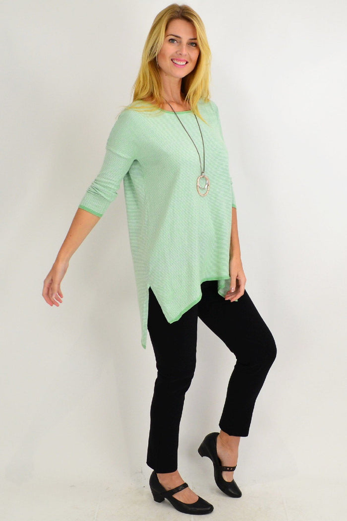 Lime green Candy Stripe Willow Tree tunic top hanging on a hanger, showcasing its vibrant colors and relaxed fit design.