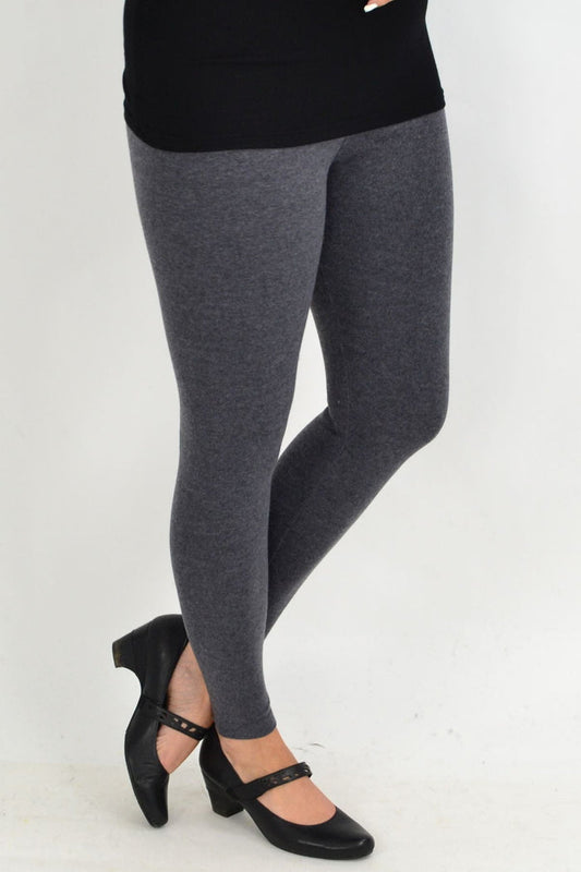 Grey long winter weight cotton leggings by Whispers, thick and cozy for cold weather, shown on a model paired with tunics.