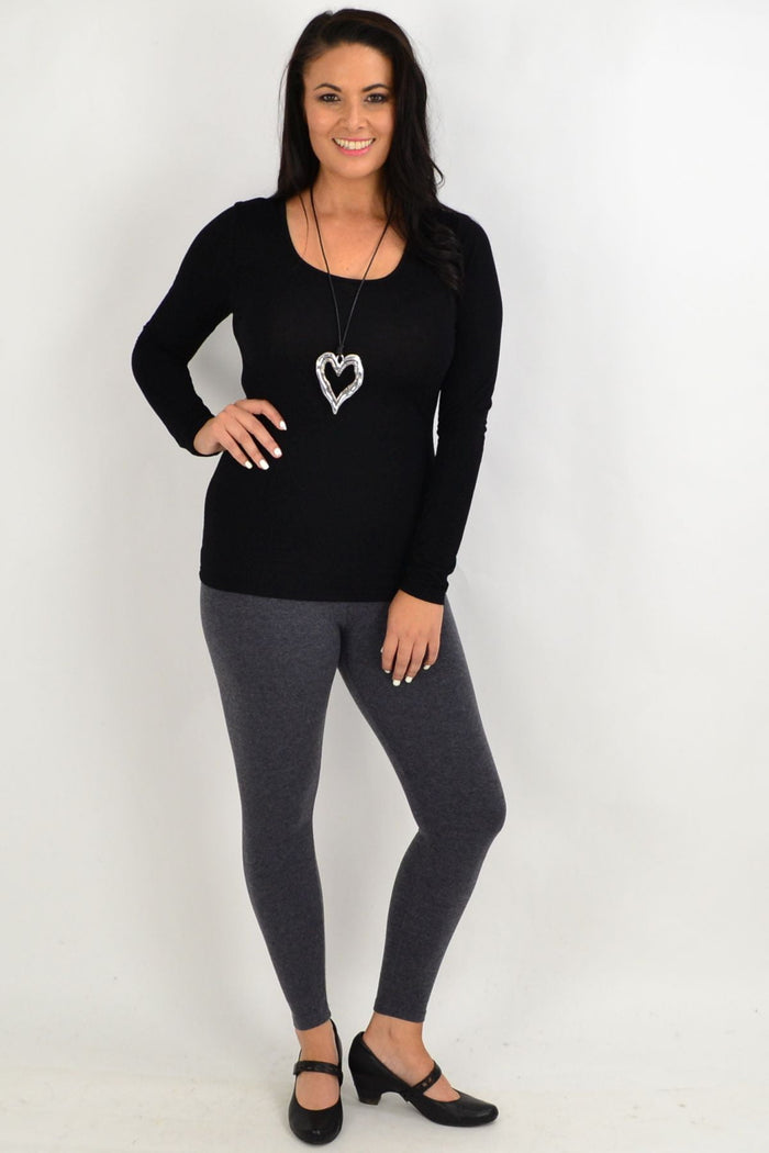 Gray long winter weight cotton leggings by Whispers, shown layered over a tunic, ideal for cold weather comfort and style.