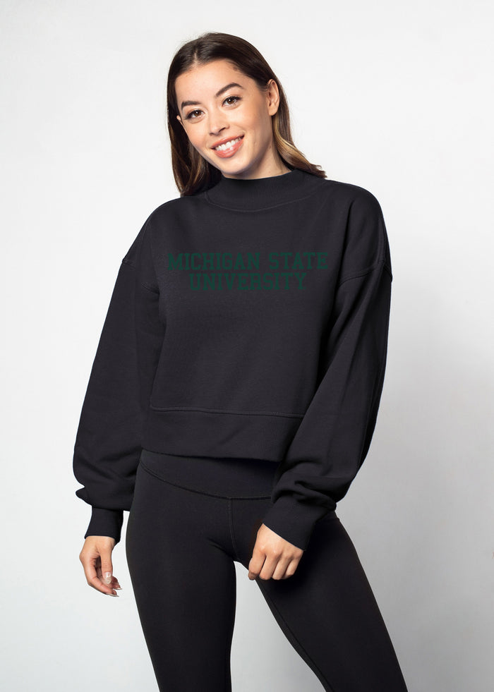 Michigan State Spartans Women's Black Relaxed, waist-length Heavyweight Fleece Sweatshirt with mock neck, drop shoulders and balloon sleeves