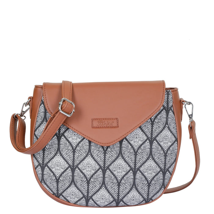 Monochrome printed canvas shoulder‑sling bag with tall soft silhouette for daily and travel use