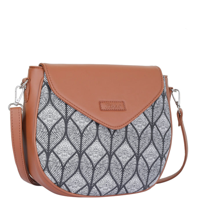 Monochrome printed canvas shoulder‑sling bag with tall soft silhouette for daily and travel use-half side view
