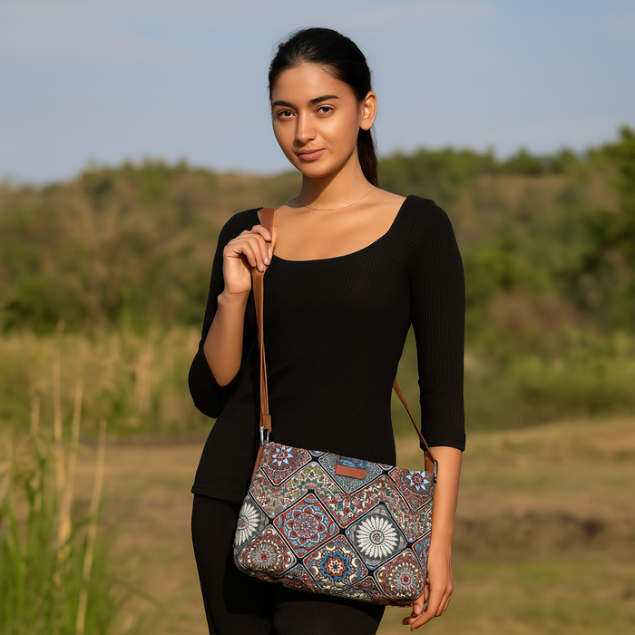 Boho multicolour printed canvas shoulder‑sling bag with soft relaxed silhouette for everyday and travel use-model image