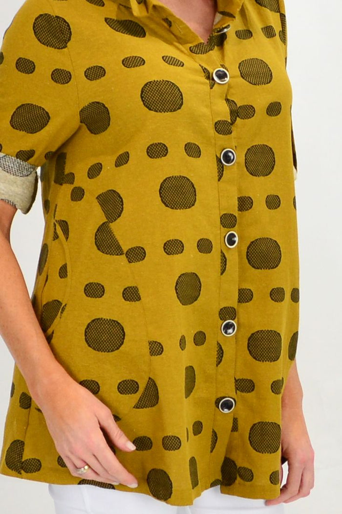 Mustard Spot High Collar Tunic Shirt by Ruby Rain, featuring a high collar and playful spotted pattern, worn as a stylish tunic.
