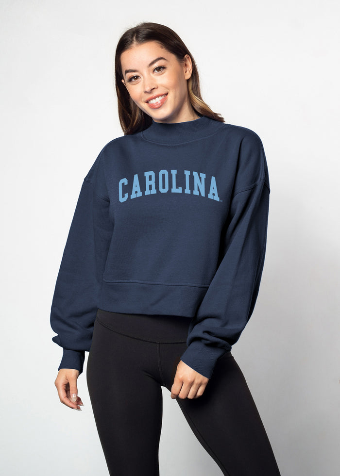 North Carolina Tar Heels Women's Navy Relaxed, waist-length Heavyweight Fleece Sweatshirt with mock neck, drop shoulders and balloon sleeves